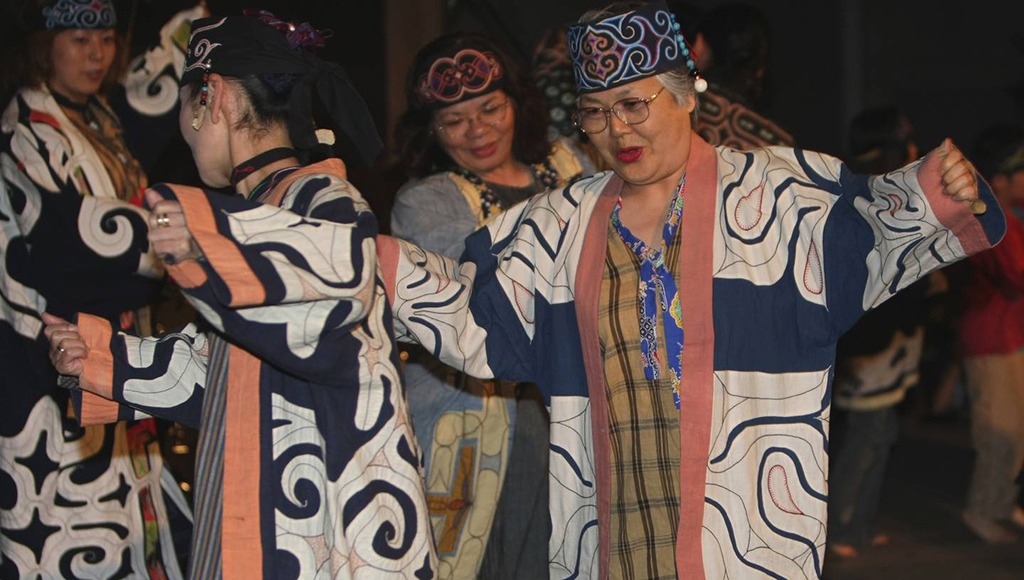 Ainu people dance at the Indigenous Peoples Summit in Sapporo, northern Japan, Friday, July 4, 2008. (AP Photo/Shizuo Kambayashi)